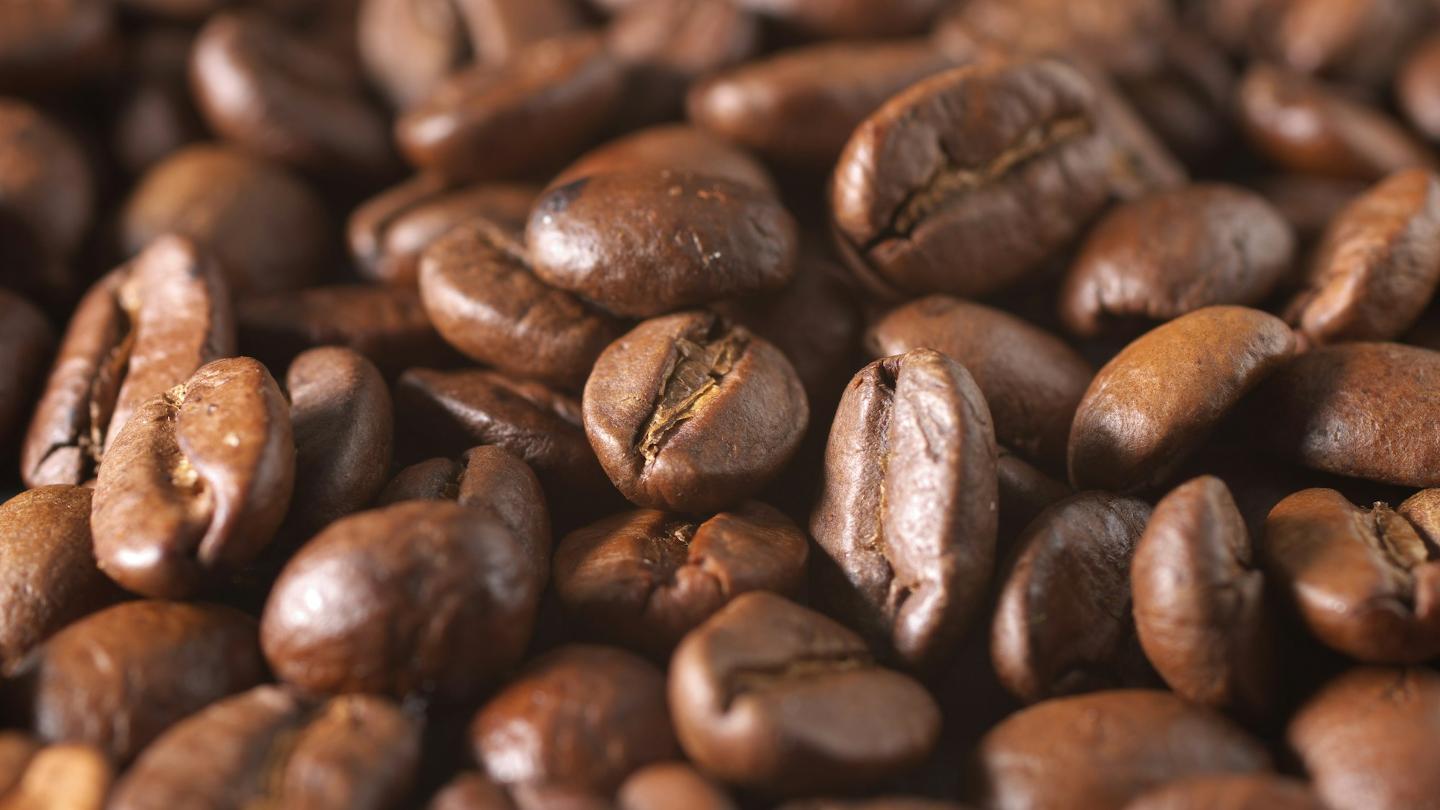 Representative coffee scene for product context; this is not product photography.